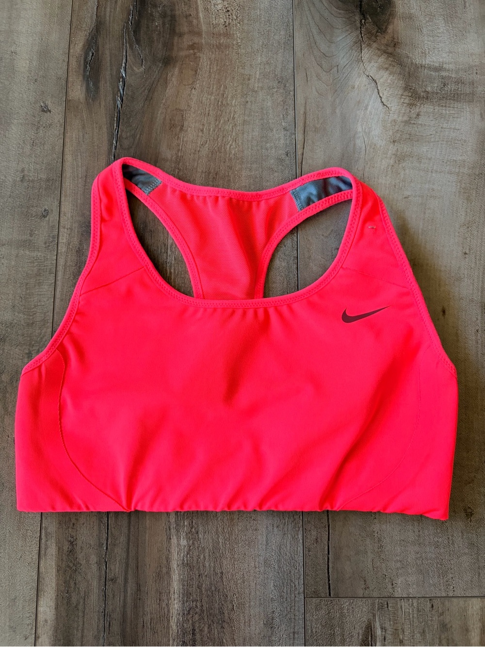 Nike Hot Coral Dri-Fit Racerback Sports Bra with Swoosh. Women’s size XS.